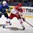 OSTRAVA, CZECH REPUBLIC - MAY 11: Denmark's Patrick Bjorkstrand #11 stickhandles the puck away from Slovenia's Ziga Pavlin #17 during preliminary round action at the 2015 IIHF Ice Hockey World Championship. (Photo by Richard Wolowicz/HHOF-IIHF Images)

